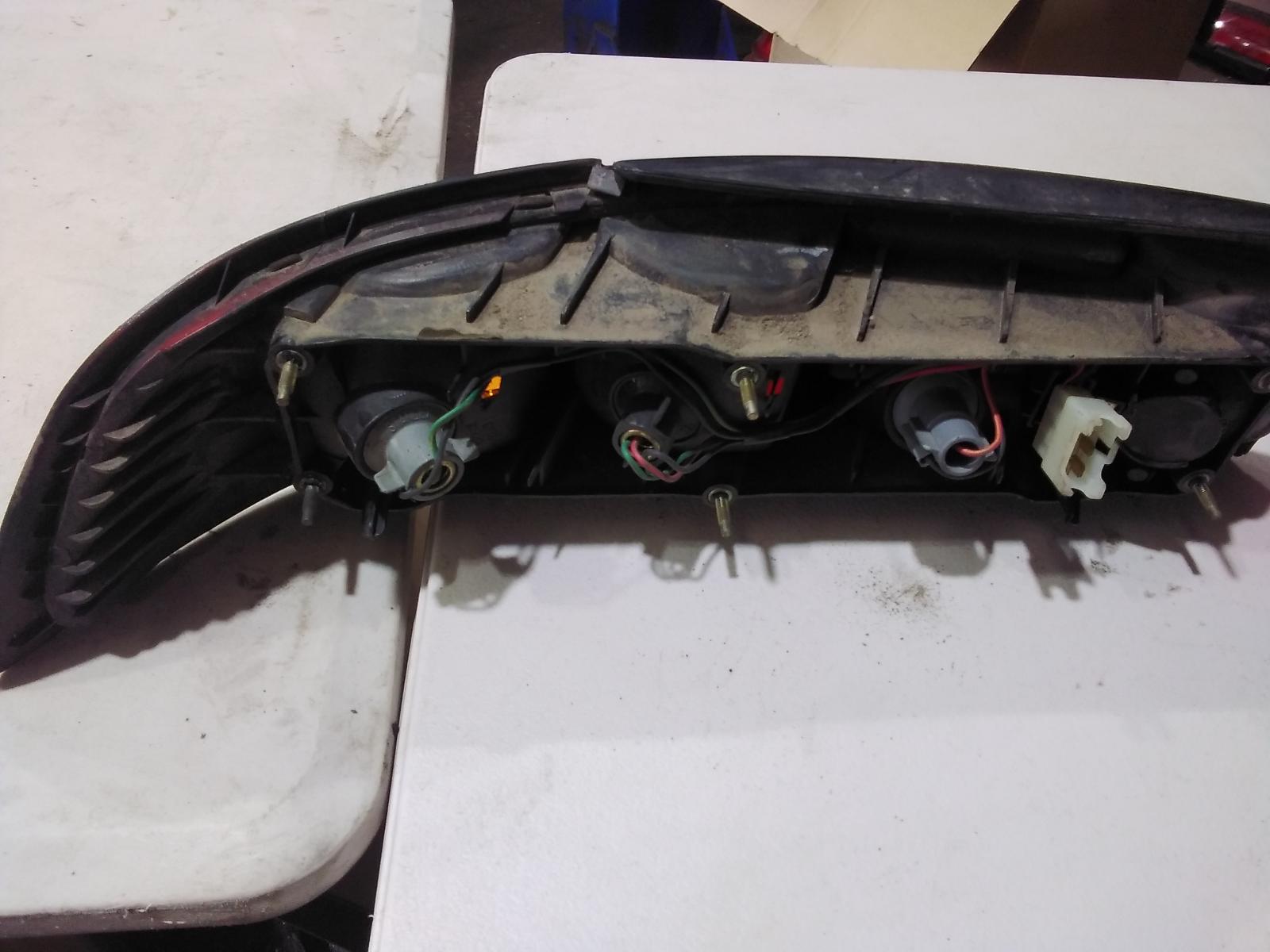 View Auto part Right Taillight Mazda 323 1996