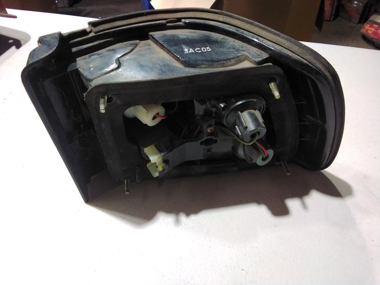 View Auto part Left Taillight Ford Laser 1991