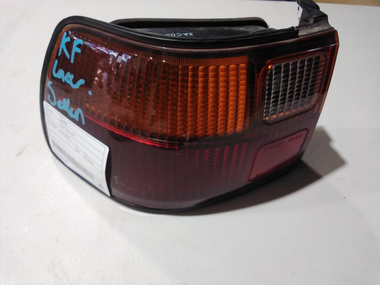 View Auto part Left Taillight Ford Laser 1991