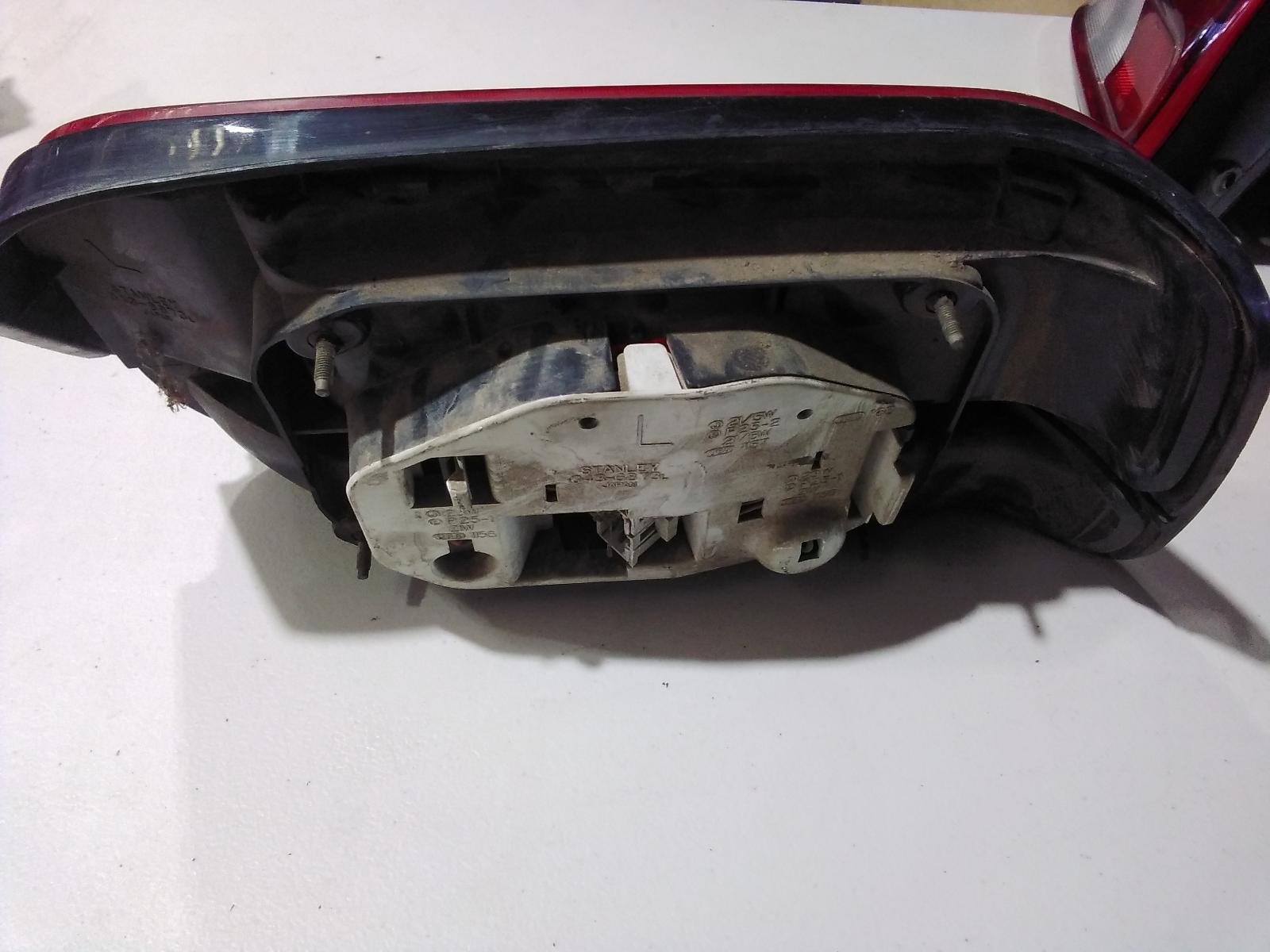 View Auto part Left Taillight Ford Laser 1986